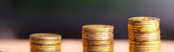 Money growth. Euro coins growing from soil. Money growth concept.